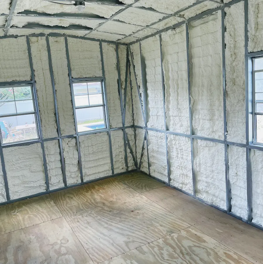 Closed-cell spray foam insulation applied to wall cavities in a residential project in Verde Village